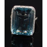 A contemporary 14ct white gold aquamarine and diamond dress ring,