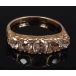 An Edwardian yellow metal and diamond set dress ring,