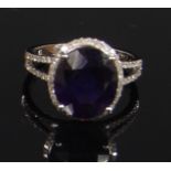 A 14ct white gold sapphire and diamond dress ring,