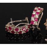 A pair of contemporary 14ct gold ruby and diamond ear studs,
