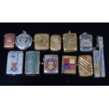 A collection of twelve Victorian and later vesta cases,