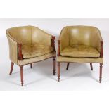 A pair of mahogany framed and green leather upholstered tub chairs, 20th century,