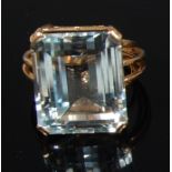 A modern 18ct gold aquamarine dress ring,