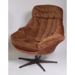 A 1960s Danish metal framed and brown upholstered swivel armchair, by H W Klein for Bramin,