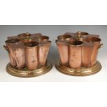 A pair of early 20th century copper and brass four division wine coolers for the S.S. Boston, by G.