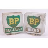 Two BP opaque glass petrol pump globes, of regular square form with rounded corners,
