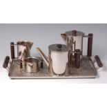 A mid-20th century silver plated four piece tea and coffee set, of cylindrical form,