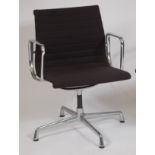 Charles Eames for Vitra - A chrome and black ribbed hopsack EA108 office swivel chair,