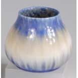 A 1930s Ruskin blue glazed pottery squat vase, of lower bulbous form,