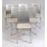 A set of six Philippe Starck brushed aluminium Hudson cafe chairs, each of traditional form,