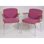 A pair of 1960s Danish tubular chrome and plywood desk elbow chairs,