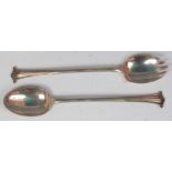 A pair of Art Nouveau silver salad servers, by Walker & Hall, Sheffield 1881,