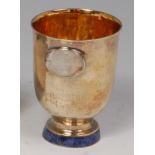 A contemporary silver gilt pedestal beaker by Goudji of Paris,