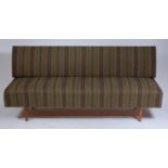 A 1960s Danish striped upholstered and teak framed four seater daybed,