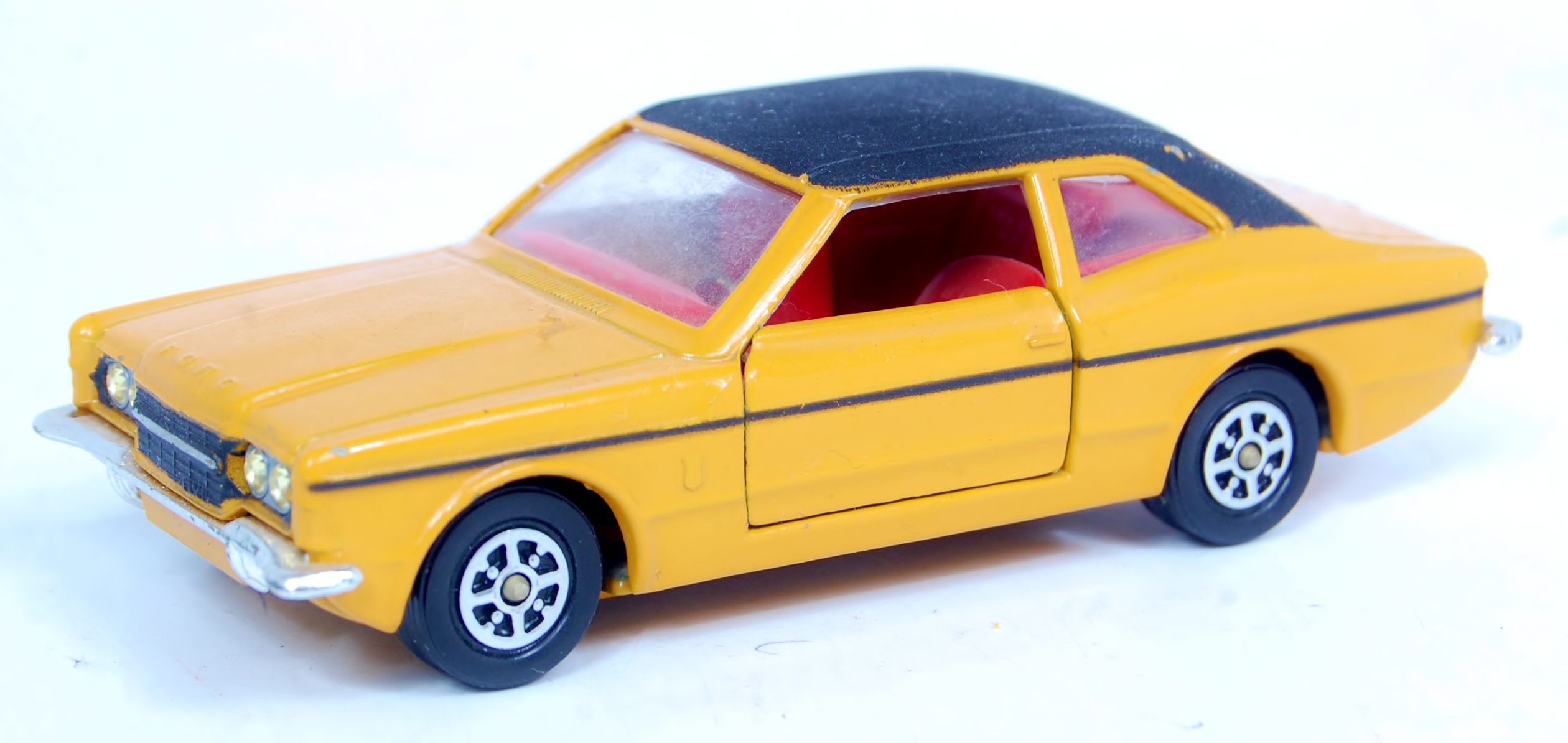 Corgi Toys 313, Ford Cortina GXL, export issue, mustard body with black roof, red interior,