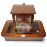 A made-up mahogany glaze topped table-top display case;