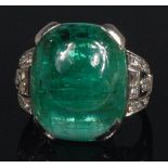An Art Deco white metal, emerald and diamond cocktail ring,