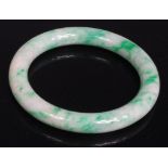 A Chinese celadon and green jade bangle,
