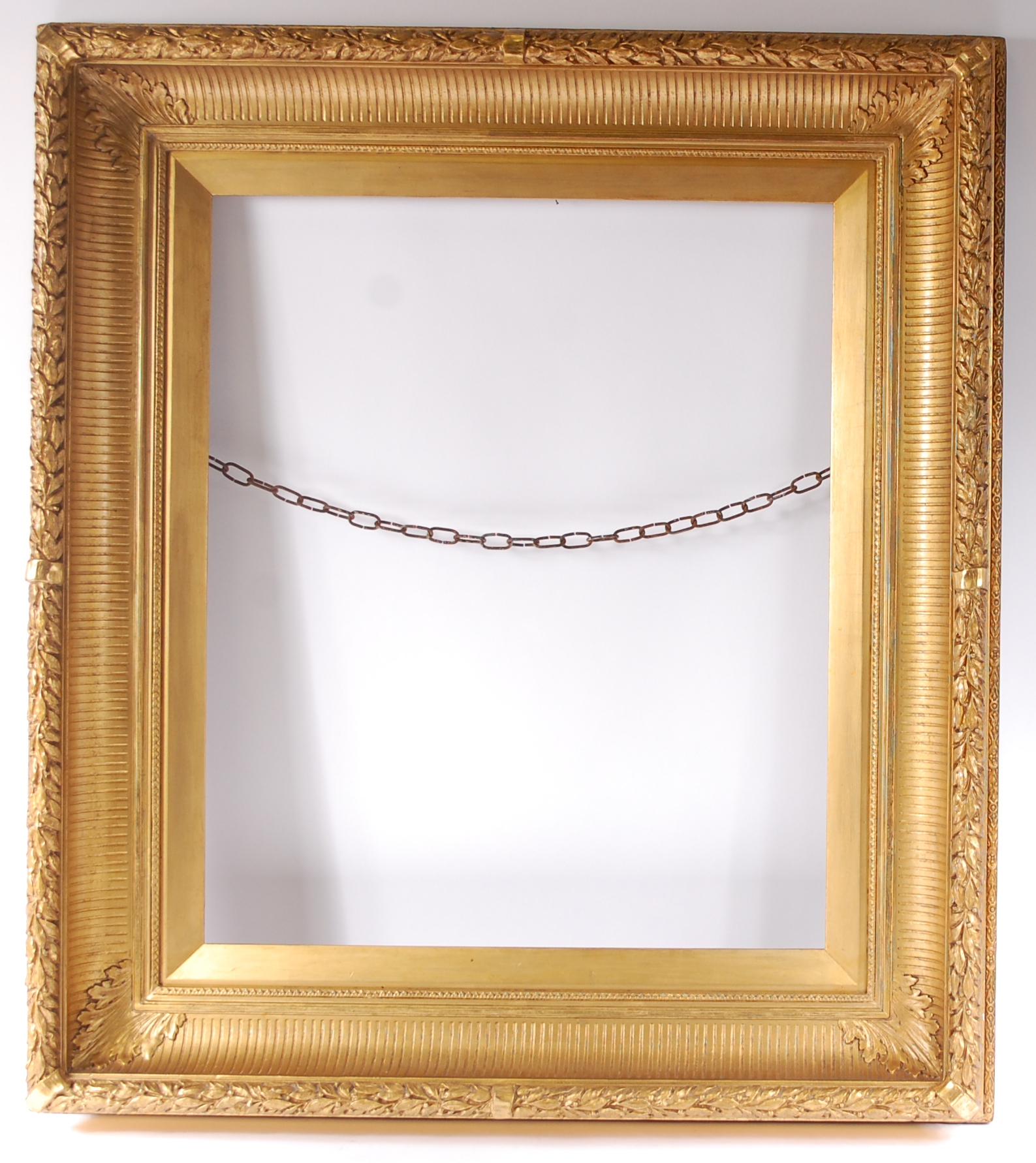 A late 19th century giltwood and gesso moulded picture frame,