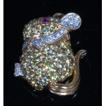 An 18ct gold, ruby and diamond set brooch, in the form of a dormouse,