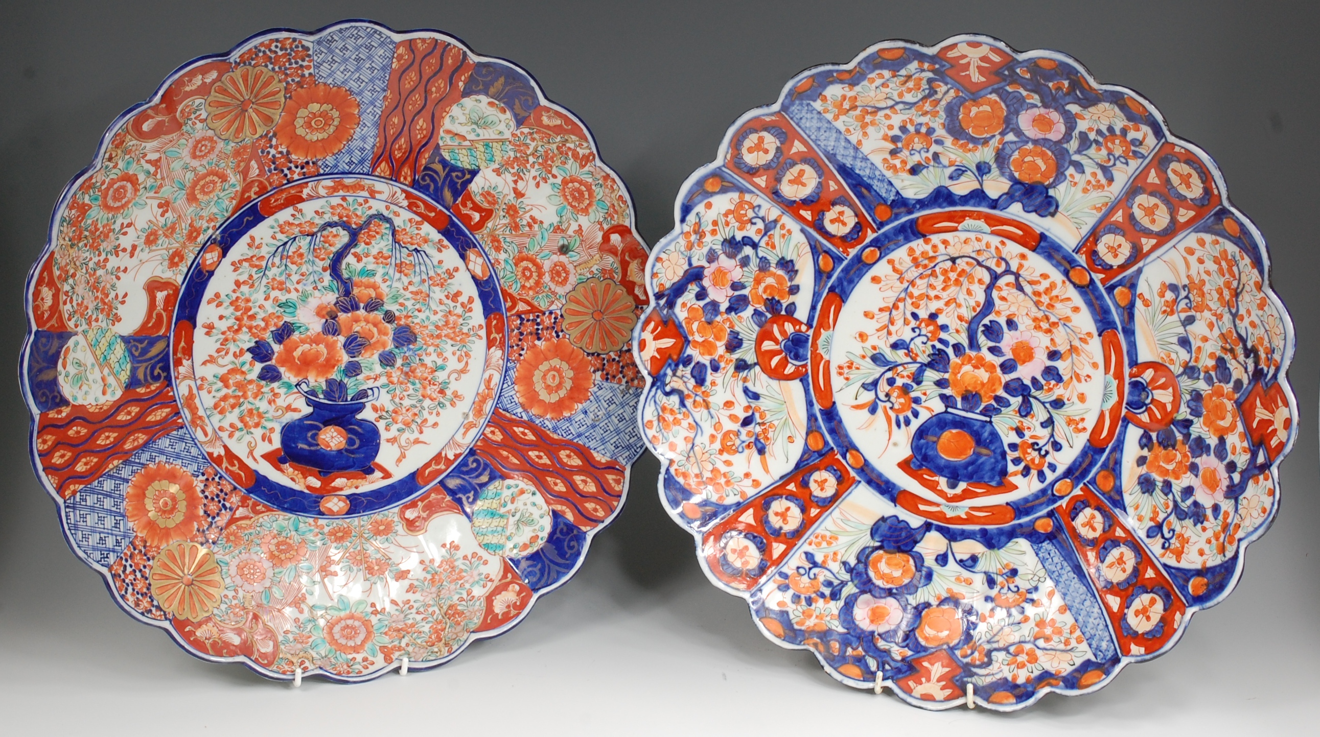A Japanese Meiji period stoneware charger, decorated in the Imari palette and heightened in gilt,