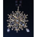 A 19th century yellow metal diamond and pearl snowflake pendant brooch,