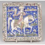 An Isnik glazed pottery tile, probably 18th century, depicting mounted hunter with hawk,