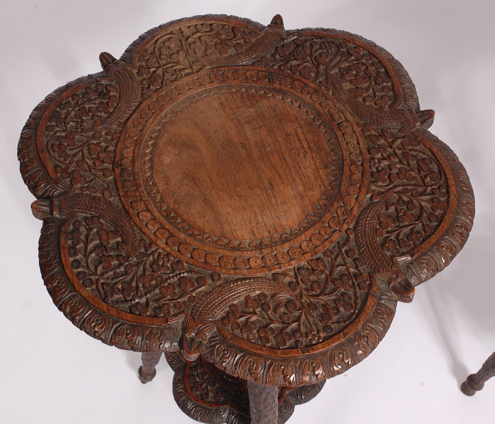 A pair of circa 1900 Indian carved teak occasional tables, of shaped circular form, - Image 3 of 3