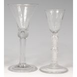 An 18th century wine glass,