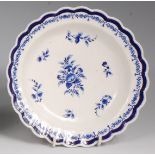 A first period Worcester tea plate, having a lobed flat rim,