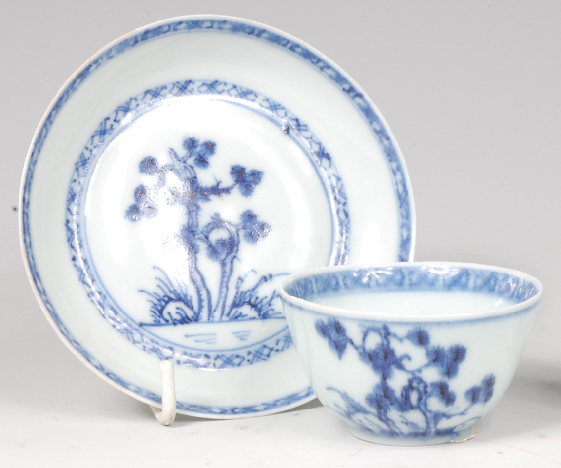 An 18th century Chinese export blue and white tea bowl on stand, from the Nanking cargo,