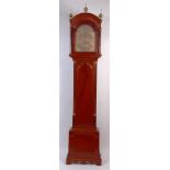A good mahogany longcase clock, the domed hood with pierced fret carving,