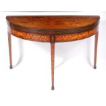 An early 19th century Dutch mahogany and floral marquetry triple leaf tea and card table,