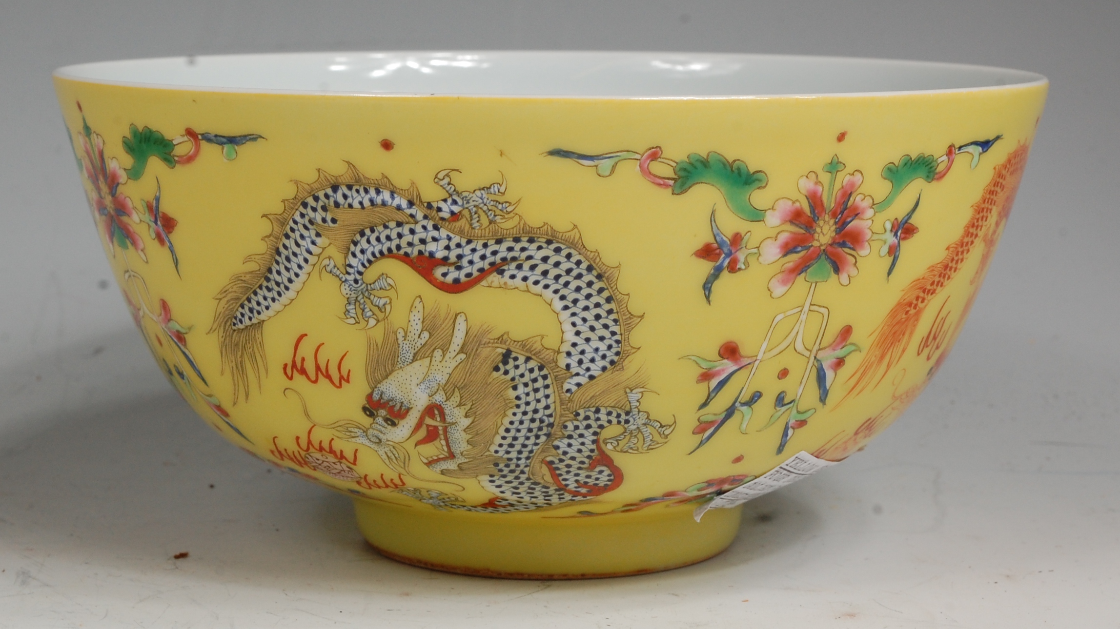 A Chinese porcelain yellow ground bowl,