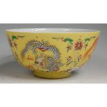 A Chinese porcelain yellow ground bowl,