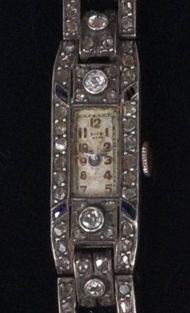 A ladies Art Deco white metal and diamond set cocktail watch,