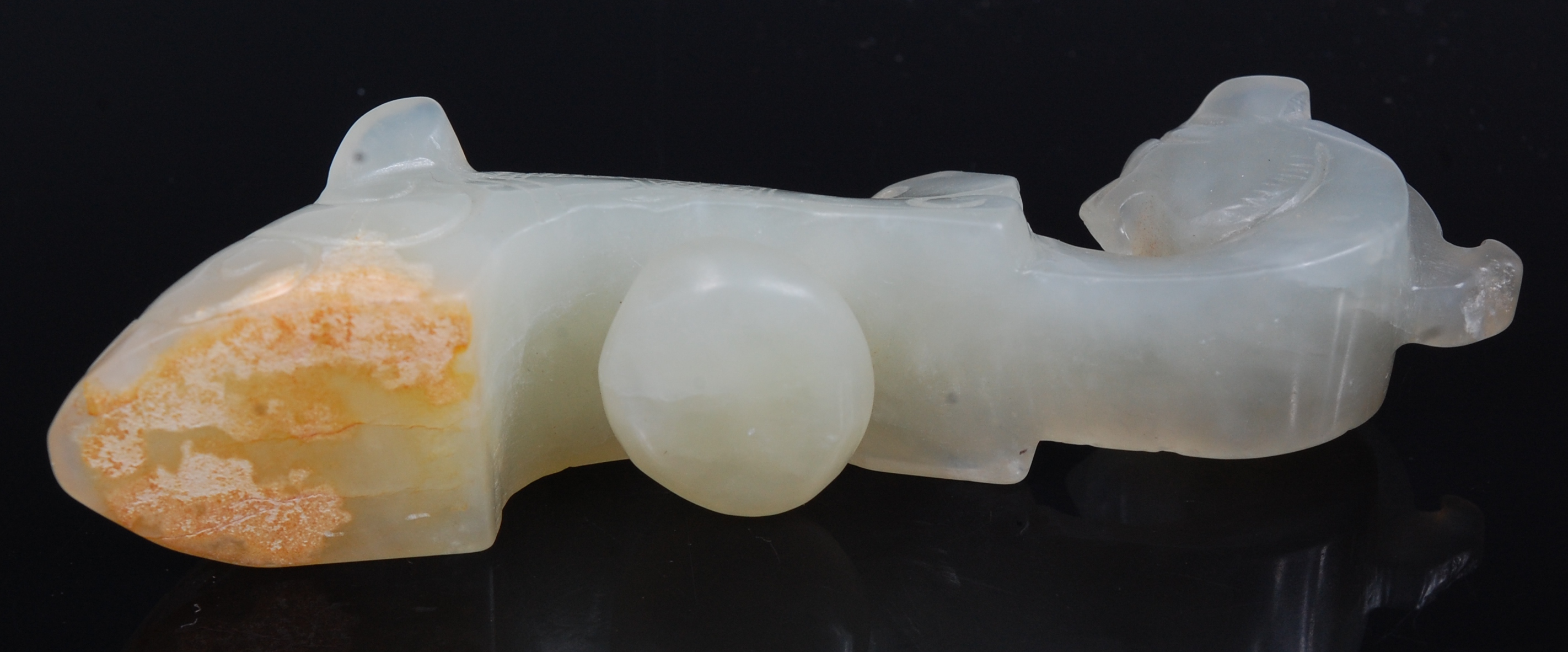 An early 20th century Chinese carved and polished celadon jade belt hook, - Image 3 of 3