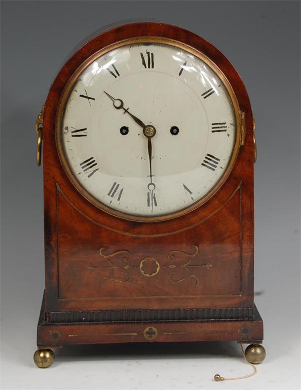 A Thwaites & Reed of London Regency mahogany and brass inlaid bracket clock,