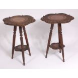 A pair of circa 1900 Indian carved teak occasional tables, of shaped circular form,