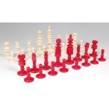 A Victorian carved bone chess set, in the Barleycorn style pattern,