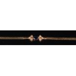 A modern 14ct gold ladies bracelet, set with a marquise cut sapphire,