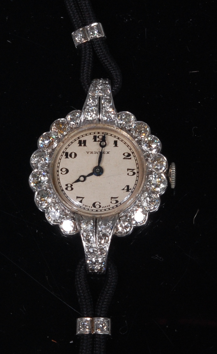 An Art Deco ladies Vertex cocktail watch, having signed silvered dial with Arabic numerals,