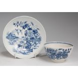 A first period Worcester porcelain blue and white tea bowl on stand, printed in the Fence pattern,