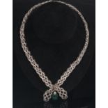 An impressive white metal, emerald and diamond necklace,