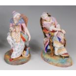 A pair of Victorian George Jones bisque figures, modelled as seated maidens, one with attendant cat,