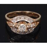 A modern 14ct gold and diamond dress ring,