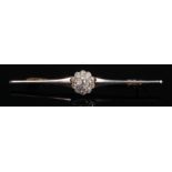 An early 20th century yellow metal, platinum faced and diamond bar brooch,