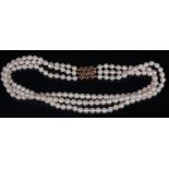 A cultured pearl triple string and knotted choker,