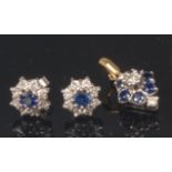 A pair of white metal, sapphire and diamond ear studs, each arranged as a flower head cluster, dia.