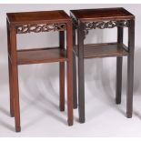 A near-pair of circa 1900 Chinese hardwood two-tier occasional tables,